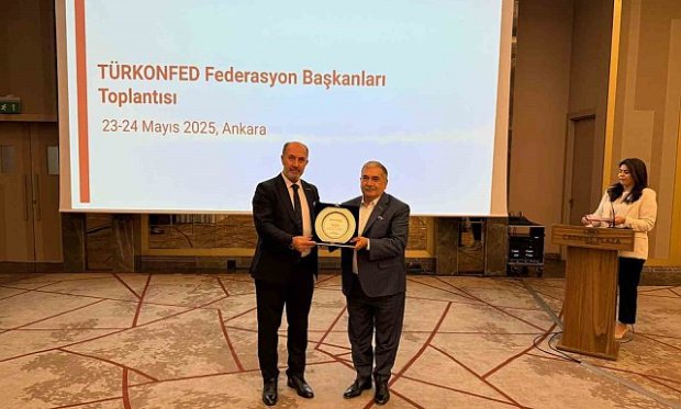 Alim'den, Öğücü'ye teşekkür plaketi